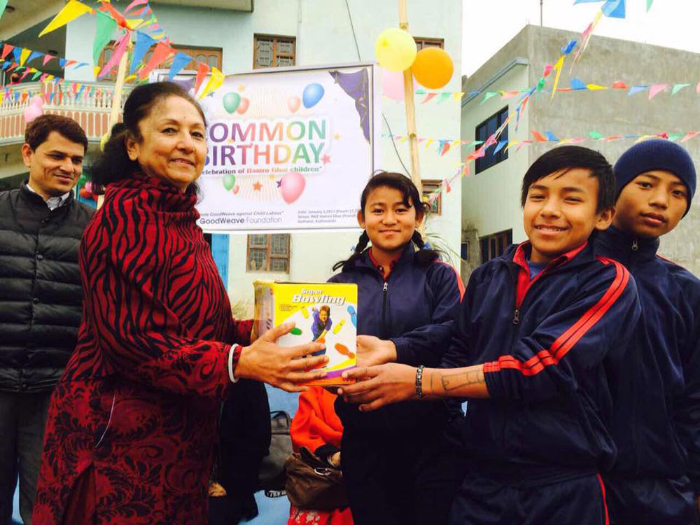 Prize distibution by executive member on common birthday